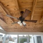 Fan on a wooden ceiling.