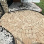 Pavers on the ground in a circle pattern.