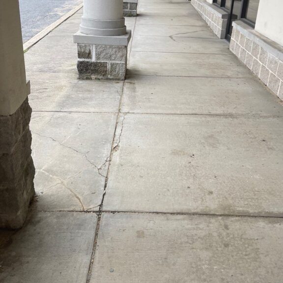 Long concrete walkway with pillars